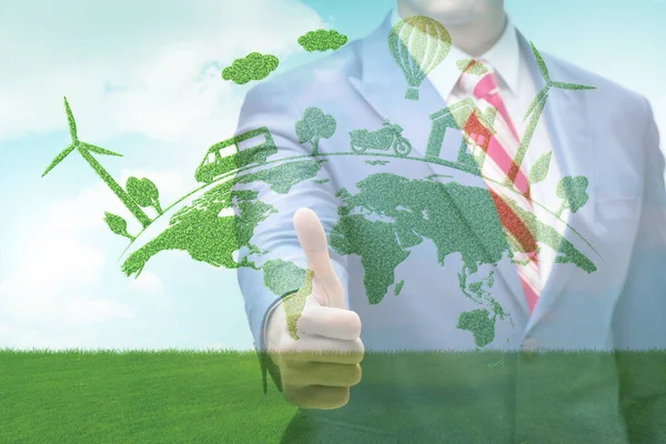 Green energy anc ecology concept with businessman — Stock Photo, Image