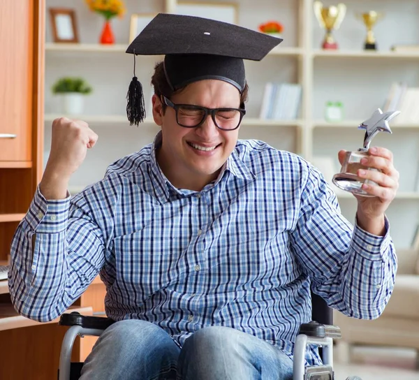 The disabled student studying at home on wheelchair — Stock Photo, Image