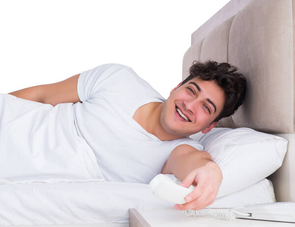 Man in bed suffering from insomnia