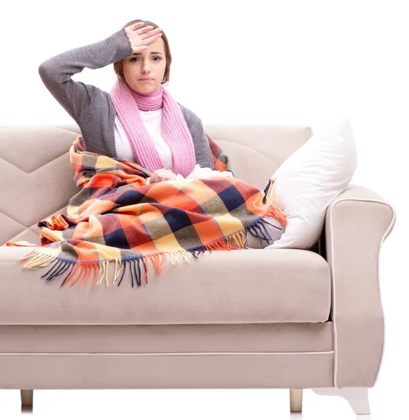 Teenager suffering from cold sitting on coach — Stock Photo, Image