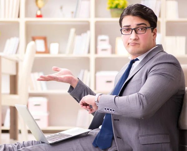 Businessman working on the floor at home — Stock Photo, Image