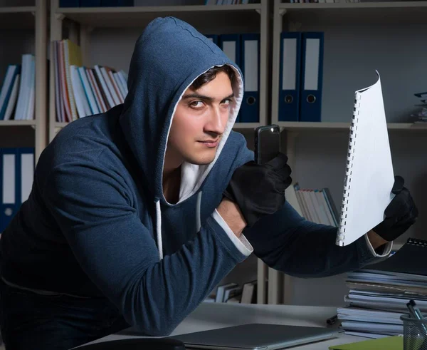 The young man in industrial espionage concept — Stock Photo, Image