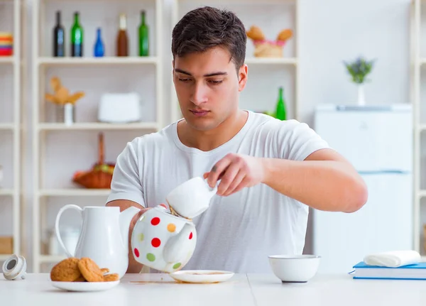 Man falling asleep during his breakfast after overtime work — Stock Photo, Image