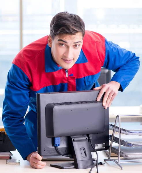 Computer repairman specialist repairing computer desktop