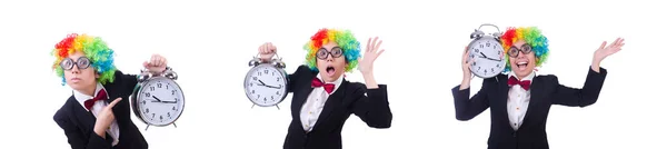 Grappige clown met klok op wit — Stockfoto