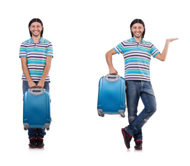 Genç adam beyaz bavullarla seyahat ediyor.