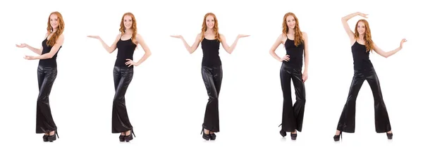 Redhead woman in black bell bottom pants on white — Stock Photo, Image