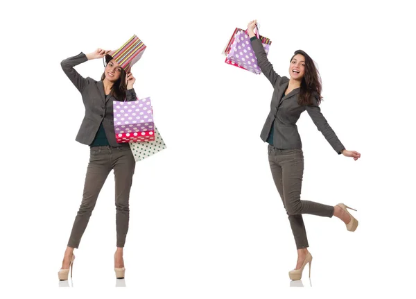 Aantrekkelijke vrouw met boodschappentassen geïsoleerd op wit — Stockfoto
