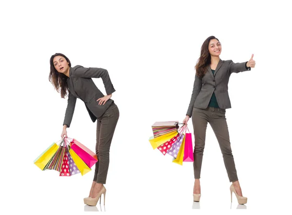 Aantrekkelijke vrouw met boodschappentassen geïsoleerd op wit — Stockfoto
