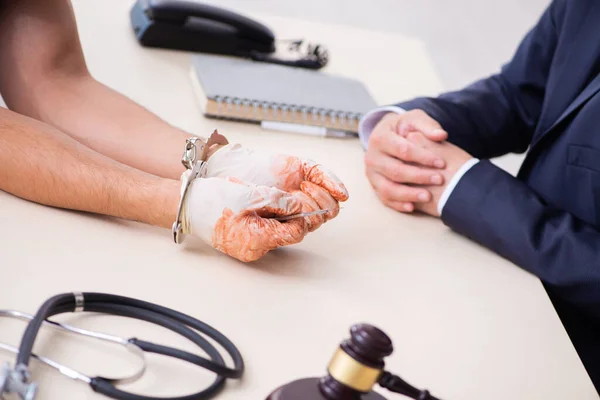 Male doctor in courthouse meeting with advocate — Stock Photo, Image