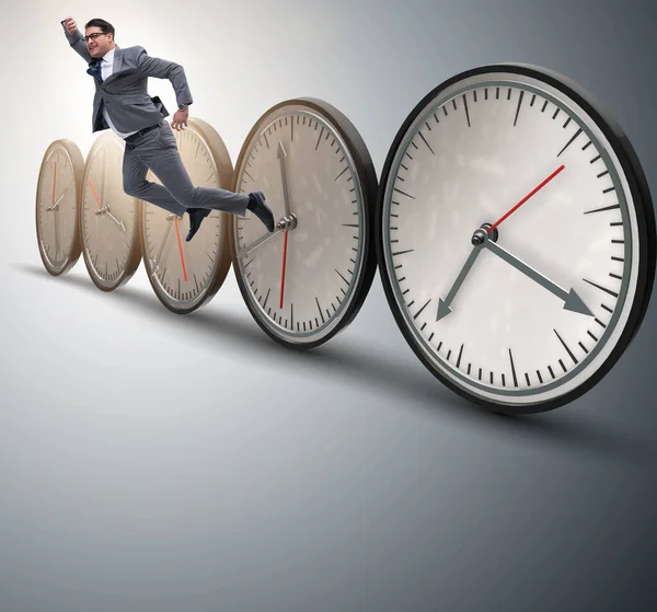 Businessman in time management concept — Stock Photo, Image