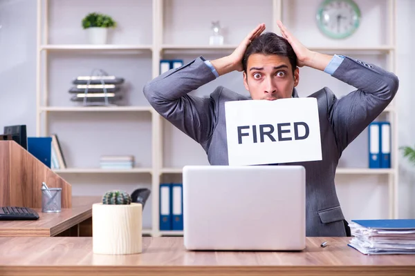 Young male employee being fired from his work — Stock Photo, Image