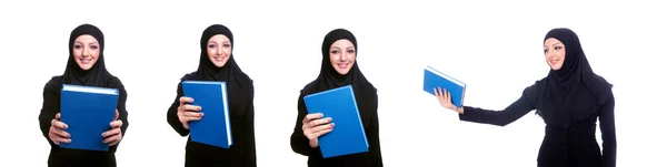 Young muslim woman with book on white — Stock Photo, Image