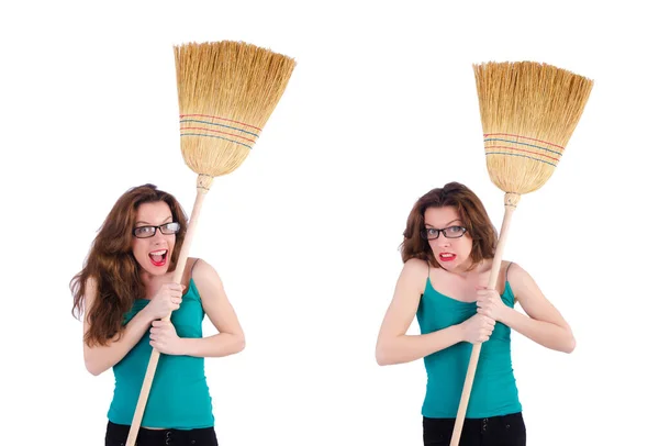 Young woman with broom on white — Stock Photo, Image
