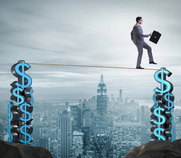 Businessman walking on tight rope — Stock Photo, Image