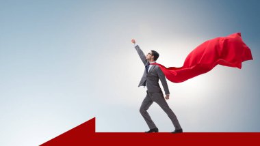 Okun üzerinde duran süper kahraman iş adamı