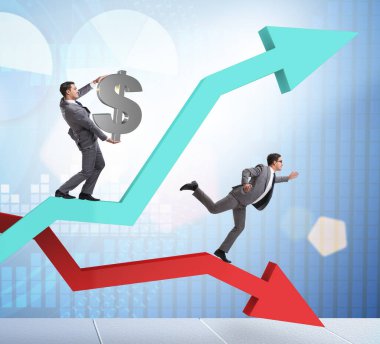 Büyüme ve gerileme grafikleriyle iş adamı