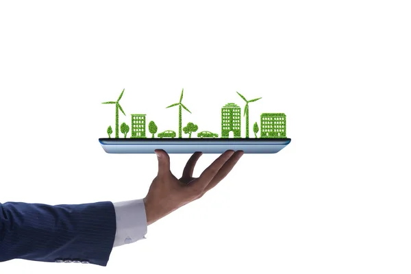 Hand holding tablet with mini ecosystem and clean energy — Stock Photo, Image