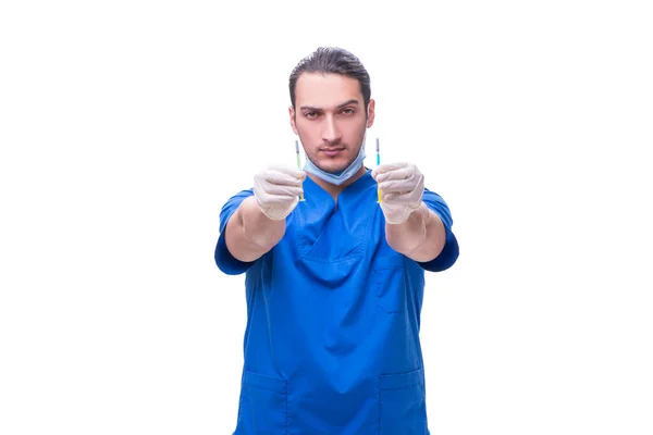 Młody przystojny lekarz ze strzykawką na białym — Zdjęcie stockowe