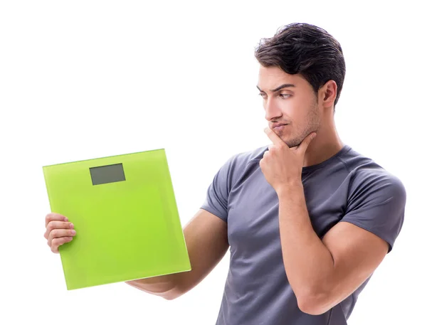 Man with scales in sports and health concept isolated on white — Stock Photo, Image