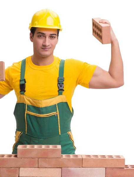 The handsome construction worker building brick wall — Stock Photo, Image