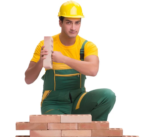 The handsome construction worker building brick wall — Stock Photo, Image