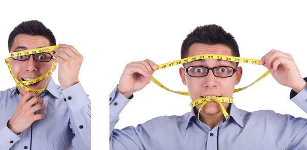 Человек с сантиметром в концепции диеты — стоковое фото