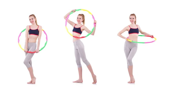 Mulher fazendo exercícios com hula hoop — Fotografia de Stock