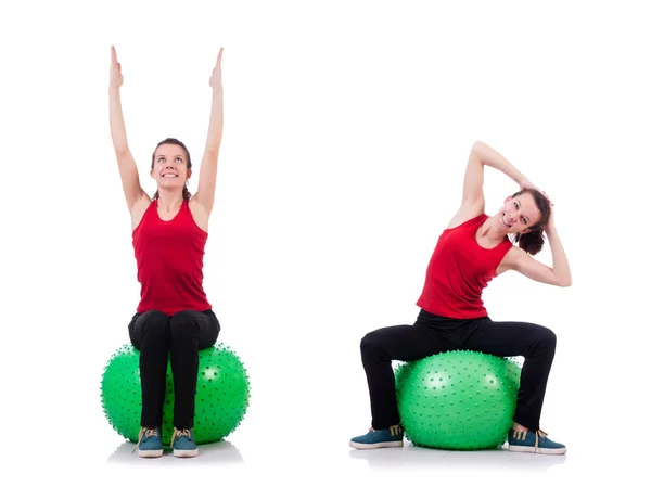 Young woman exercising with swiss ball — Stock Photo, Image