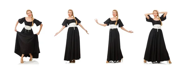 Высокая женщина в длинном черном платье изолирована на белом — стоковое фото