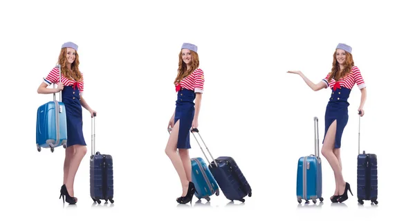 Reisebegleiterin mit Koffer auf weißem Grund — Stockfoto