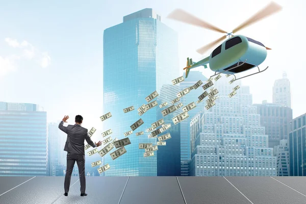 İş adamıyla helikopter para konsepti — Stok fotoğraf