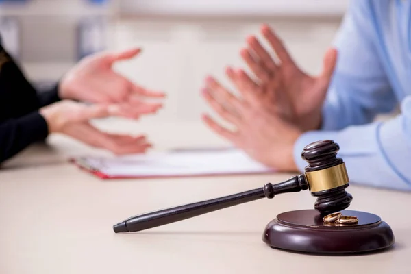 Young pair in courthouse in divorcing concept — Stock Photo, Image