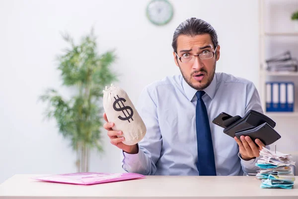 Young male employee in budget planning concept — Stock Photo, Image