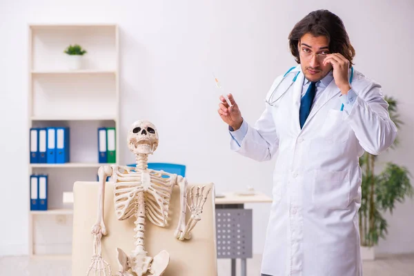 Crazy doctor examining dead patient