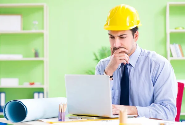 Young male architect working at the project — Stock Photo, Image