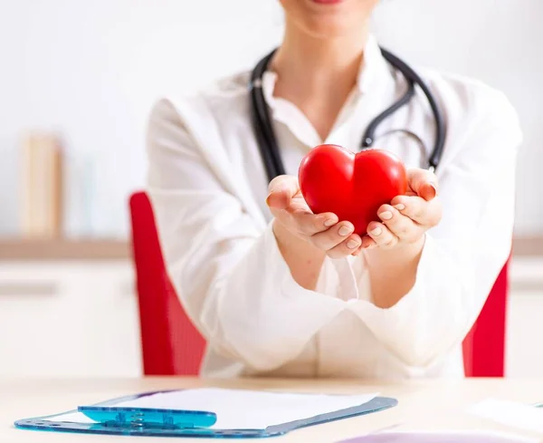 Young doctor in heart care concept — Stock Photo, Image