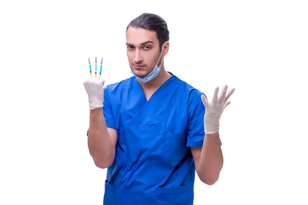 Jeune beau médecin avec seringue isolée sur blanc — Photo