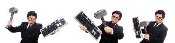 Empleado joven con teclado aislado en blanco —  Fotos de Stock