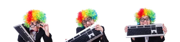 Grappige clown met toetsenbord op wit — Stockfoto