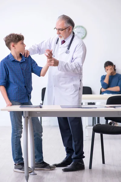 Young boy visiting doctor in hospital