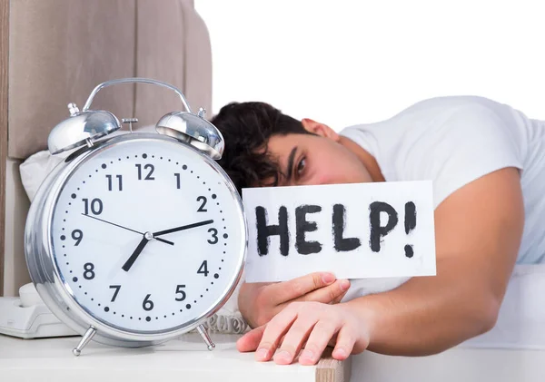 Man in bed suffering from insomnia — Stock Photo, Image