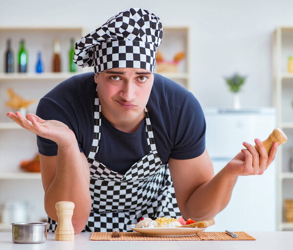 Chef cook cooking a meal breakfast dinner in the kitchen