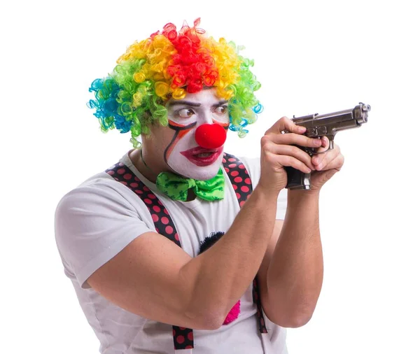 Rolig clown med en pistol isolerad på vit bakgrund — Stockfoto