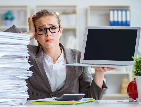 Young businesswoman accountant working in the office