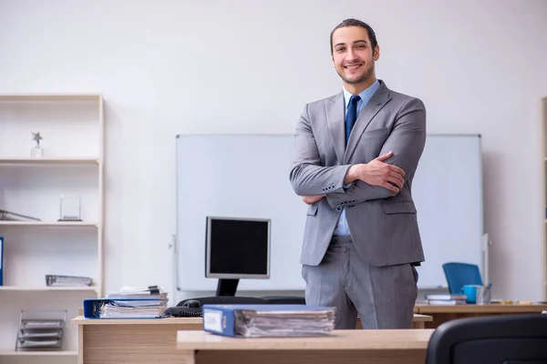 Young male businessman employee working in the office — Stock Photo, Image