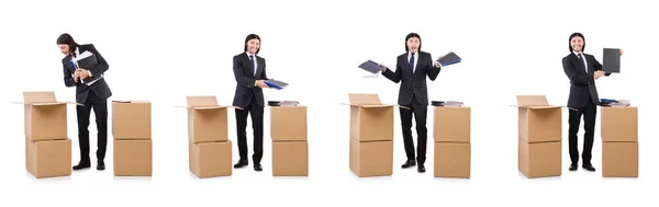 Hombre divertido con cajas en blanco — Foto de Stock