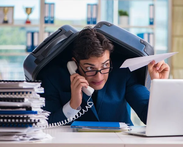 Employee thinking of vacation due to excessive workload