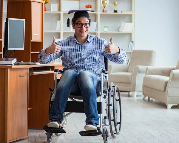 Disabled student studying at home on wheelchair — Stock Photo, Image