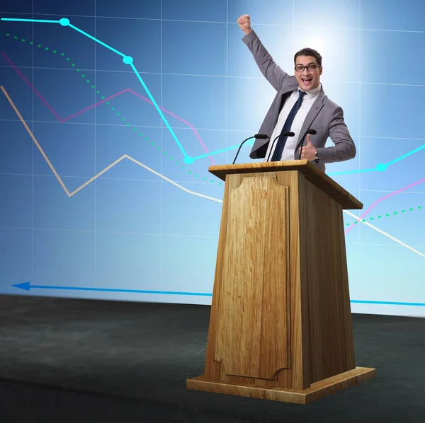 Man businessman making speech at rostrum in business concept — Stock Photo, Image